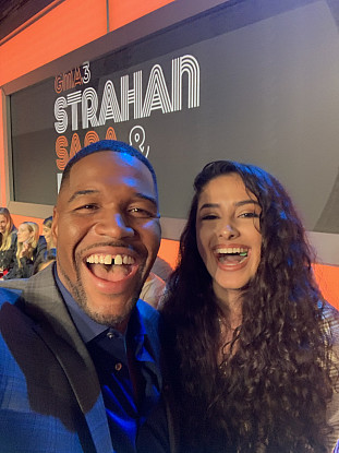 Ariana Contreras '22 snaps a photo with GMA host Michael Strahan!