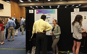 Marisa Dunigan '15 presents her research poster at the NERMACS conference in Ithaca, NY.