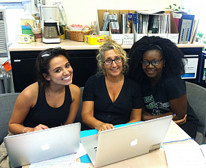 Prof. Ann Aguanno works on the JoVE manuscript with her research students, Victoria McIlrath (left) and Alice Trye (right).
