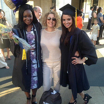 Alice Trye (left) and Victoria McIlrath (right) celebrate their 2015 graduation with their research mentor, Prof. Ann Aguanno.