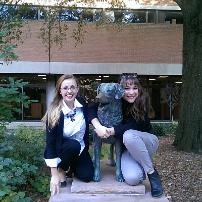 Marisa (left) and Katie (right) pose with the UMBC mascot.