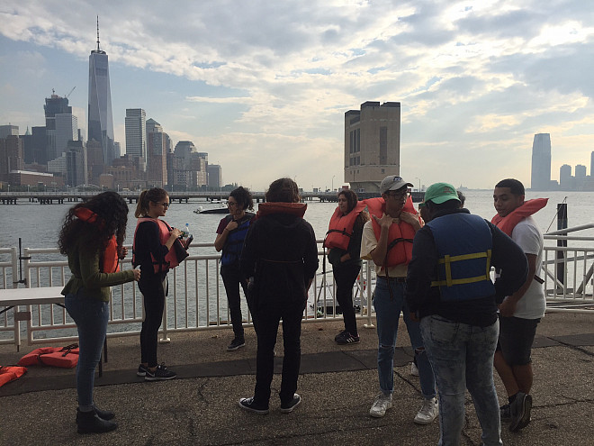 NYC 103 freshmen test water quality at the River Project at Pier 40 on the Hudson River.