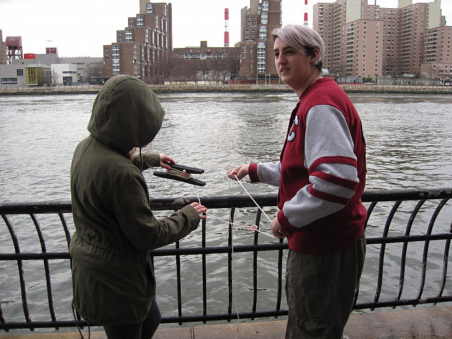 Students in Prof. Leri's Chemistry and the Environment (CHEM/ENV 105) class conduct water quality testing on the East River.