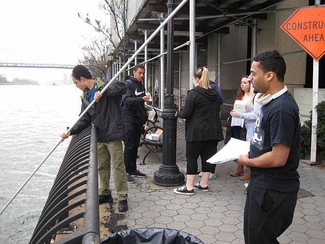 Students in Prof. Leri's Chemistry and the Environment (CHEM/ENV 105) class conduct water quality testing on the East River.