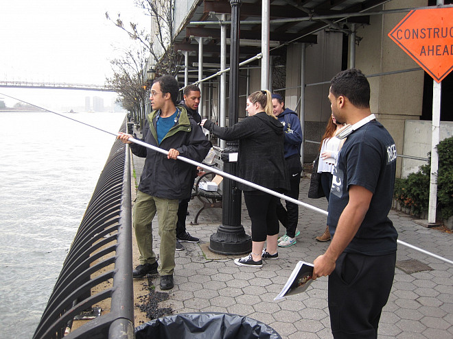 Students in Prof. Leri's Chemistry and the Environment (CHEM/ENV 105) class conduct water quality testing on the East River.