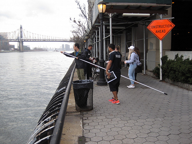 With the Queensboro Bridge as a backdrop, students in Prof. Leri's Chemistry and the Environment (CHEM/ENV 105) class conduct water quali...