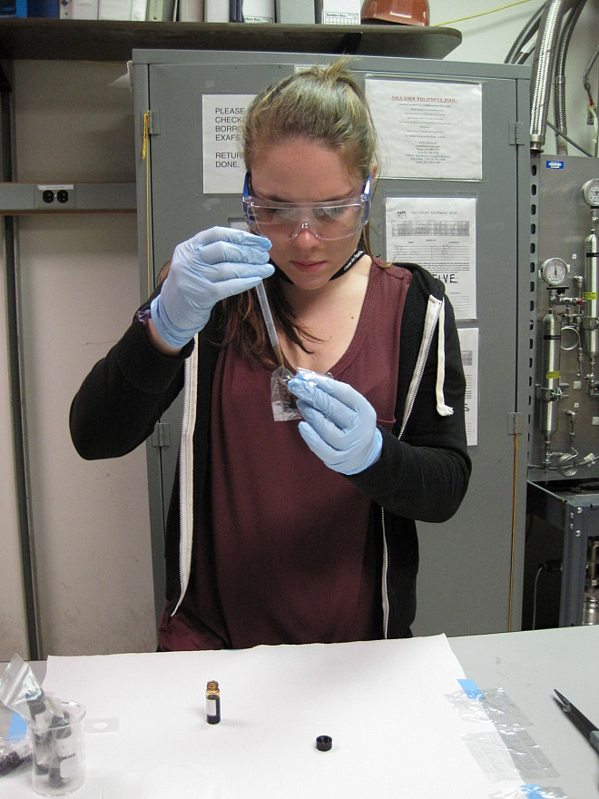Katie prepares one of her crude oil samples.