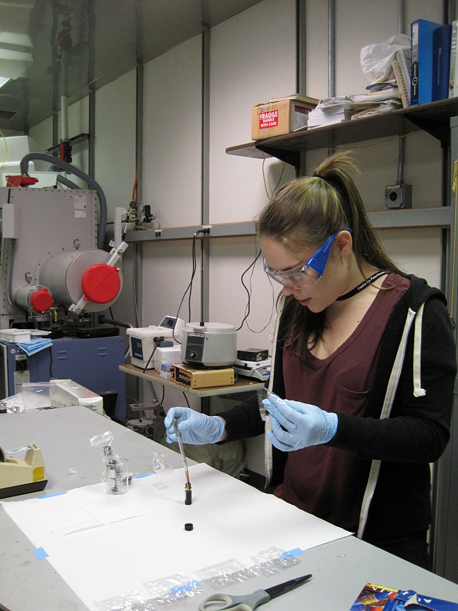 Katie prepares one of her crude oil samples.