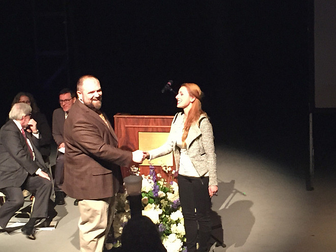 Marisa Dunigan receives the Student-Faculty Collaboration award during the Honors Day ceremony for her work with Prof. Leri.