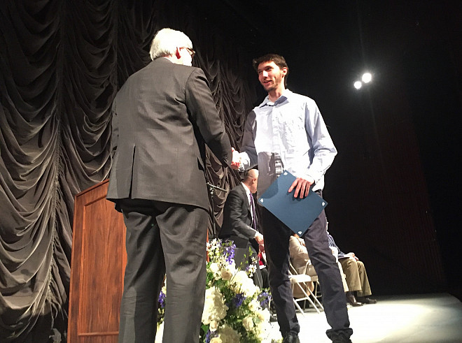 Austin Gellis receives the Certificate in the Environmental Studies Minor at the Senior Awards Ceremony.