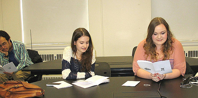 Emma-Sabrina Kamen and Michaela Brown, the winners of first place in the p day contest, read their entry.