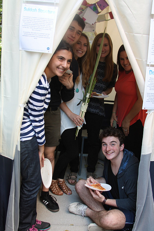 Hillel Students and Advisors in the Sukkah