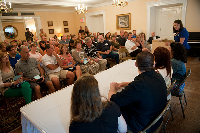 Student representatives speak at a Parent's Orientation session