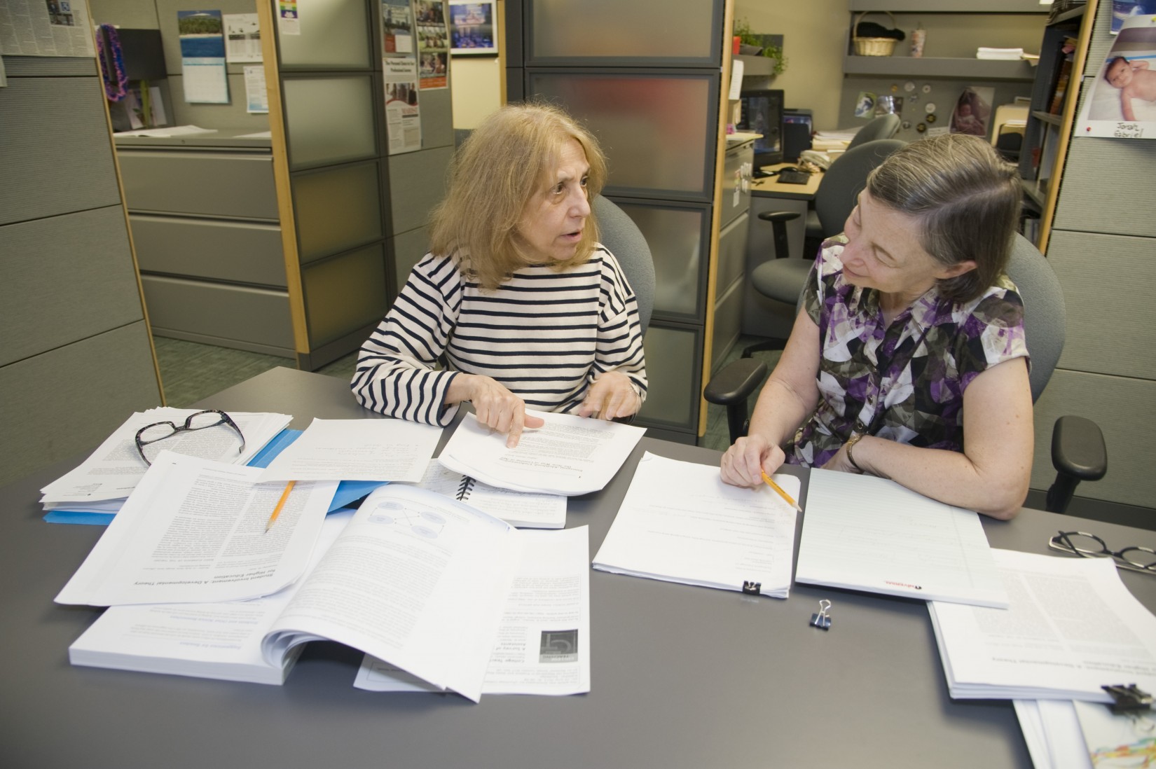 Professors Ann Jablon (CSD) and Linda Solomon (Psychology) work on an interdisciplinary research project