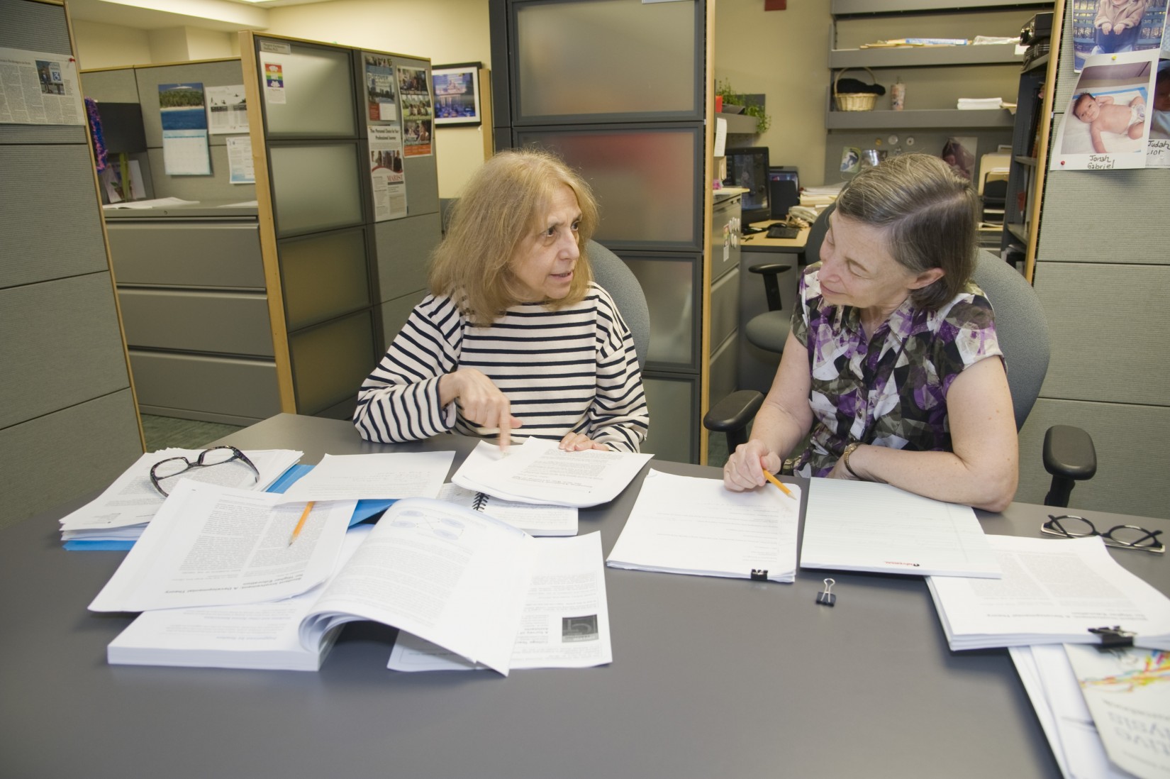 Professors Ann Jablon (CSD) and Linda Solomon (Psychology) work on an interdisciplinary research project