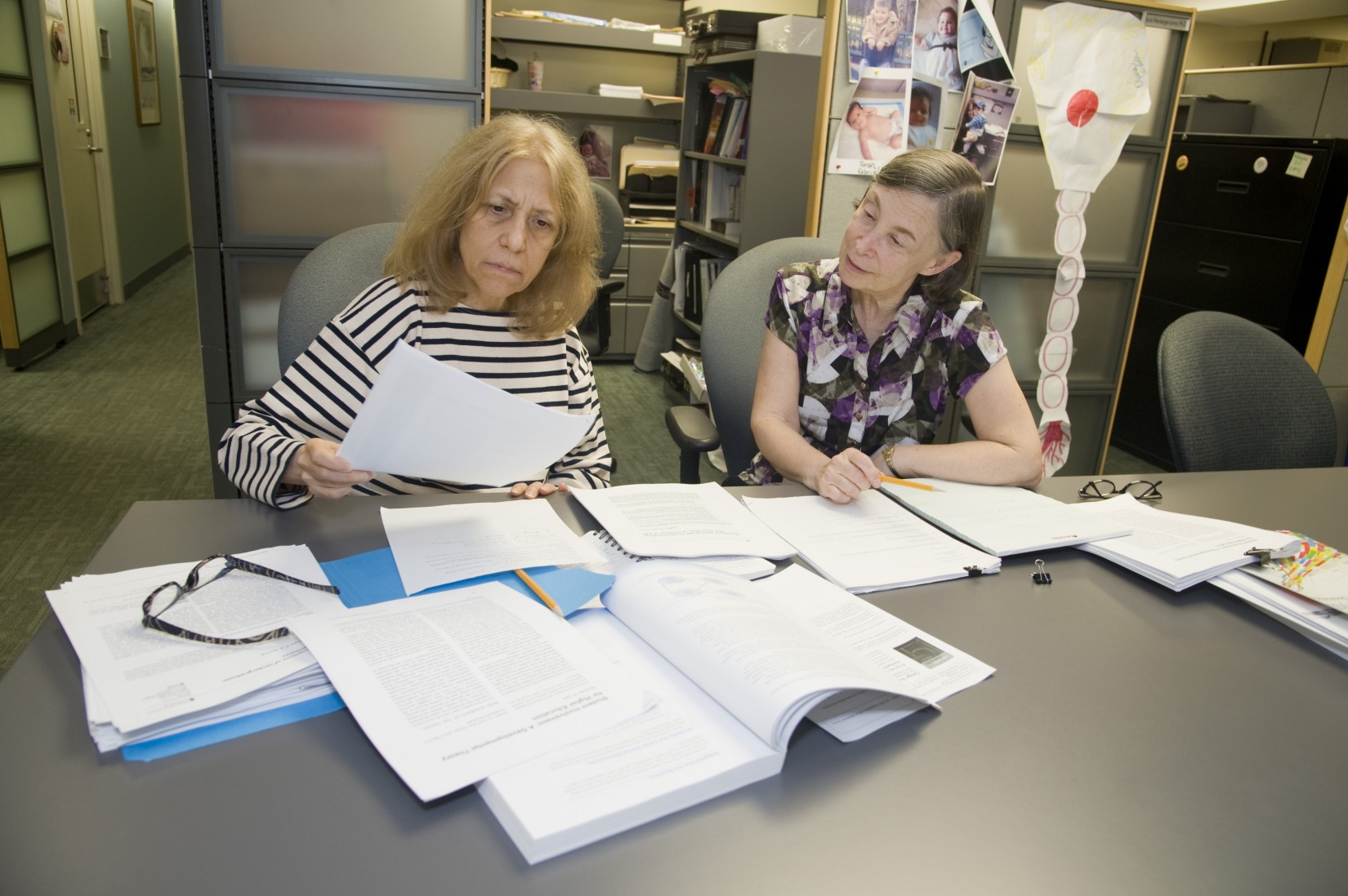 Professors Ann Jablon (CSD) and Linda Solomon (Psychology) work on an interdisciplinary research project