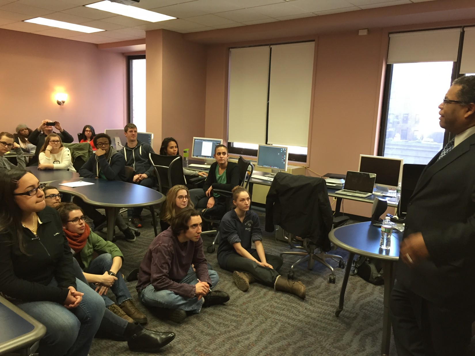 Mark Groce of the MTA speaking with graphic design and video students about preparing for their career field and interning with Transit T...