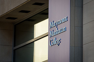Marymount Manhattan College sign on Carson Hall's building zoomed in