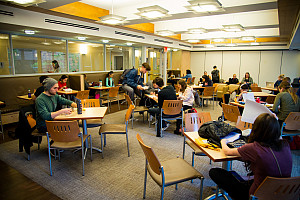 Zoomed-out shot of students in the Commons