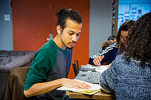 Students doing homework in Starbucks