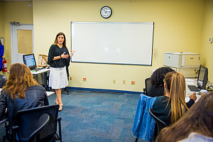 Professor teaching students in a classroom
