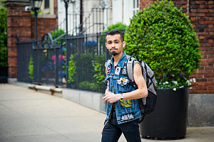 Student standing outside of Marymount Manhattan College on East 71st Street