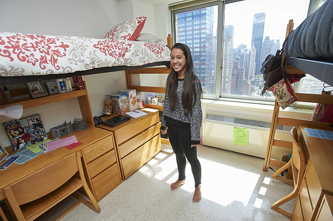 A resident in her new home at the 55th Street Residence Hall