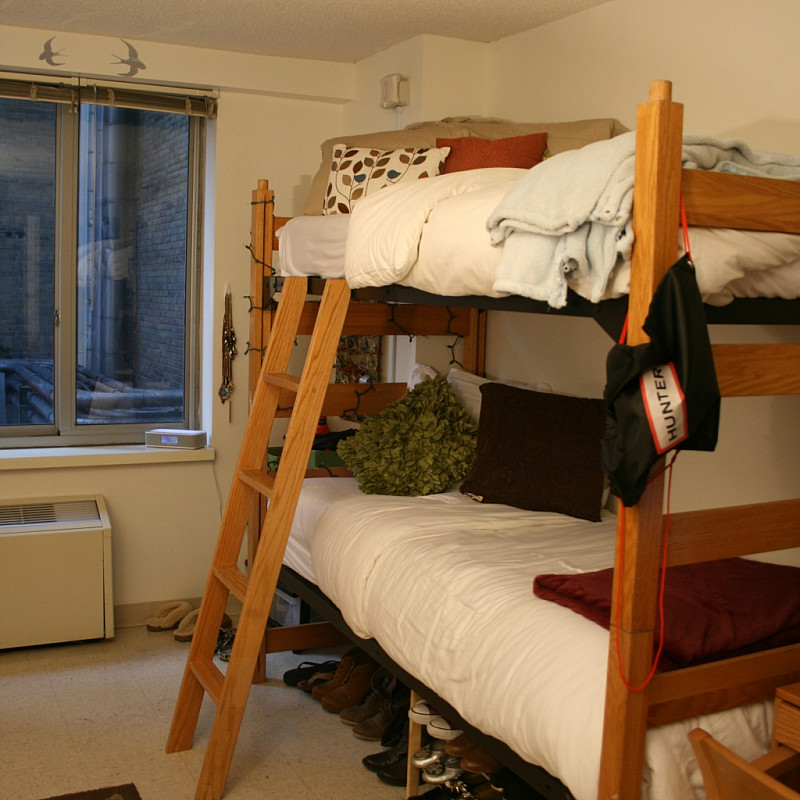 A bedroom in the 55th Street Residence Hall