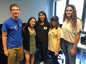 Anne Alvergue (center) with students from the Storytelling Across Media seminar