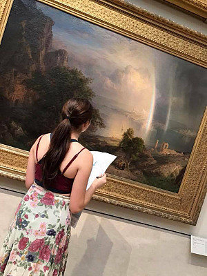 Student examines artwork at the Met