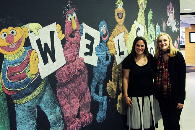 Psychology professor Nava Silton poses with Carol, an MMC transfer student, at the Sesame Workshop, where Carol interns. Leaders in their...