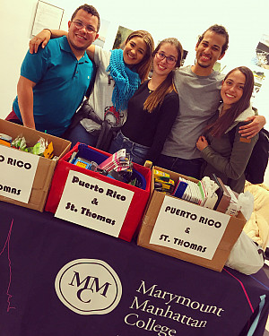 MMC Students man the donation table in Carson Hall