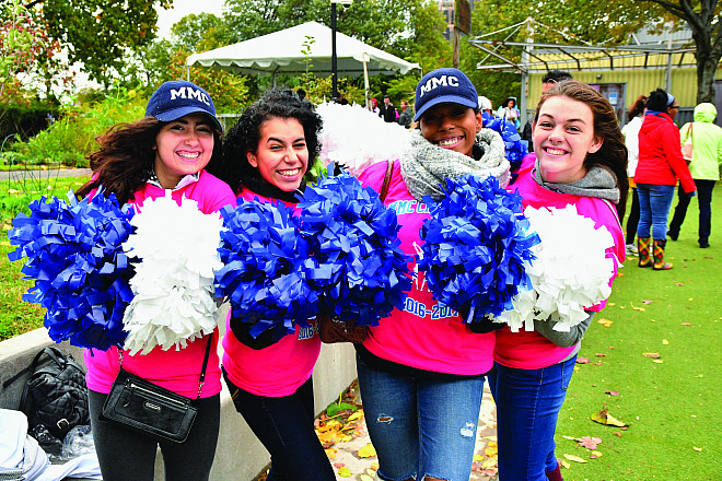 Cheerleaders for the MMC flag football game that happens at each Homecoming out in Roosevelt Island.