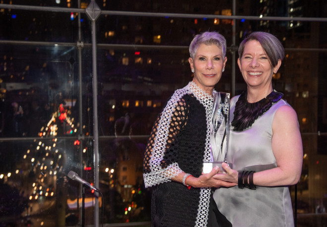 Honoree Carol Berman receives the 2019 Visionary Award from President Kerry Walk