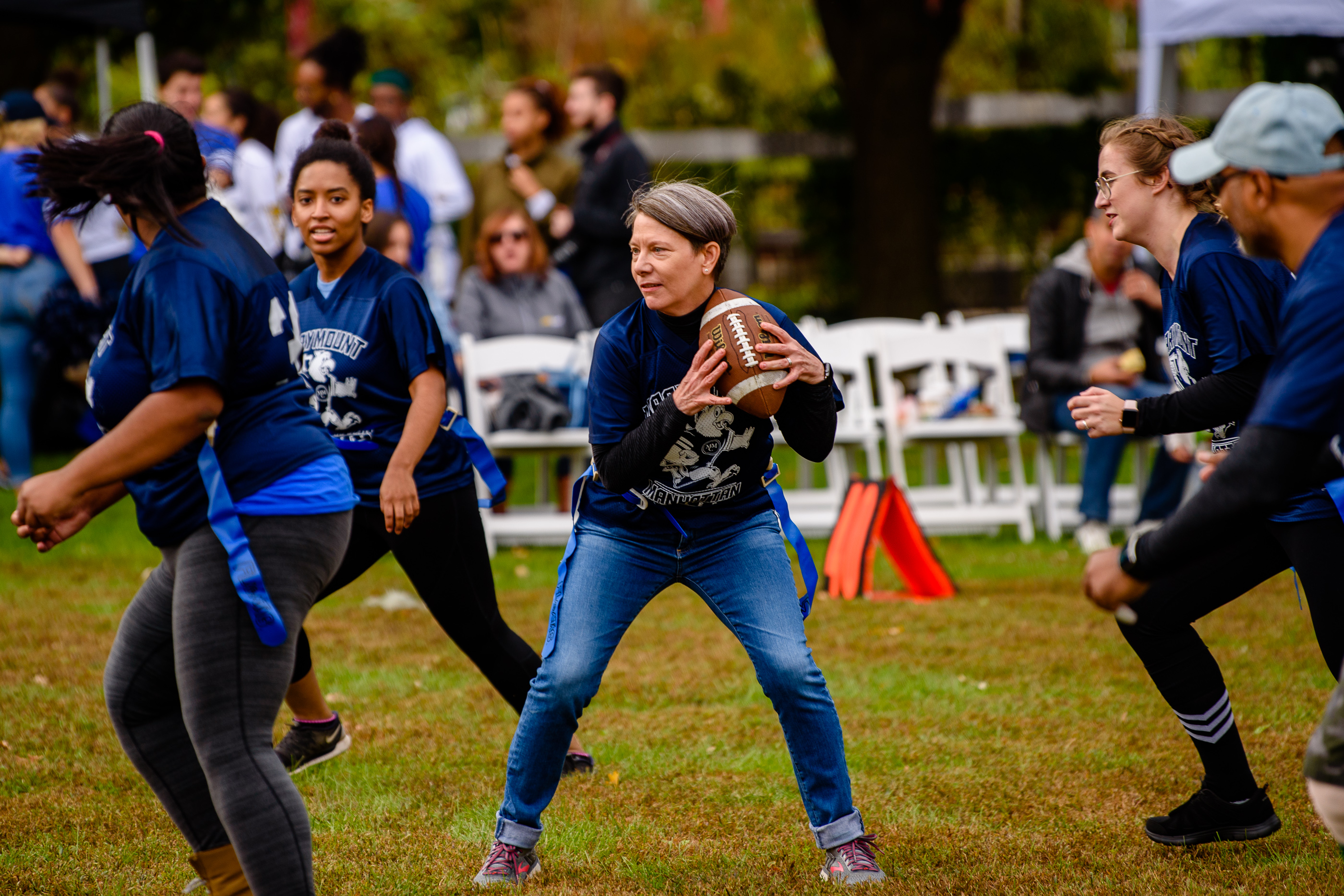 President Kerry Walk, Ph.D. gets ready to throw a touchdown