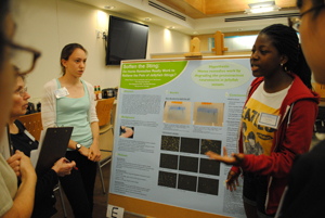 Brearley High School sophomores Funmi Adejobi (right) and Kaitlin Hanss (left) explain the findings from their study at the New York City...