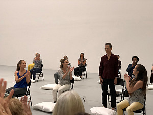 Suzzanne Ponomarenko '12 (left) and Heather Robles '09 (right) with Yvonne Rainer (standing) at MoMA, 09/16/2018.