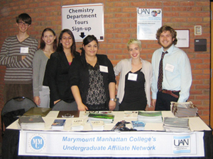 Marymount Manhattan students display information about MMC's Undergraduate Affiliate Network.