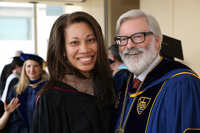 Chairperson of the Board of Trustees, Hope Knight '85, and President Judson R. Shaver