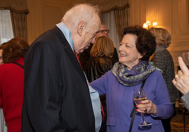 Board Secretary Judy L. Robinson '90 congratulating Dean Baker