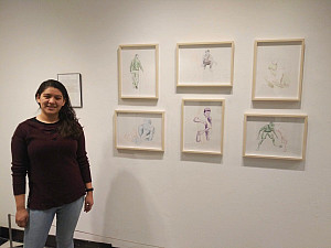 Itzamary Dominguez '19 with her Missing Moments artwork 