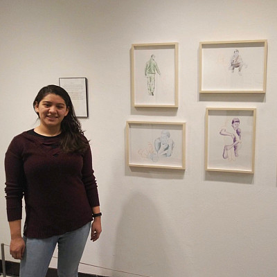 Itzamary Dominguez '19 with her Missing Moments artwork 