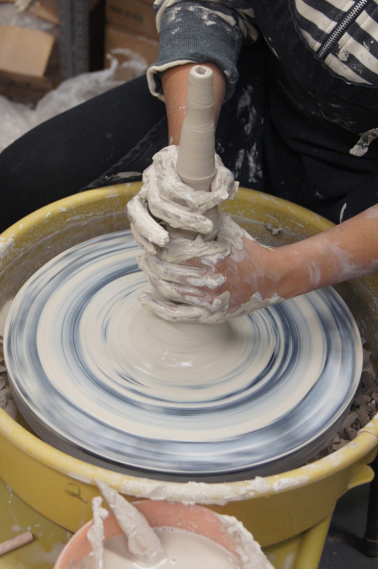 Throwing ceramics on the wheel