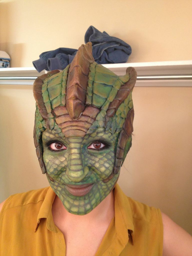 MMC student wearing a dragon mask